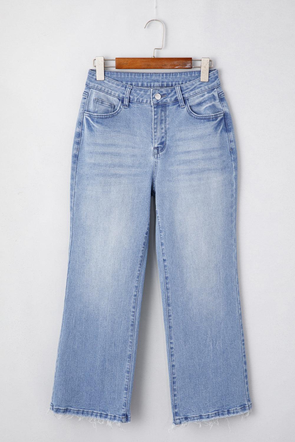 Beau Blue Mineral Wash Raw Hem High Waist Flared Jeans with vintage style and flattering fit.