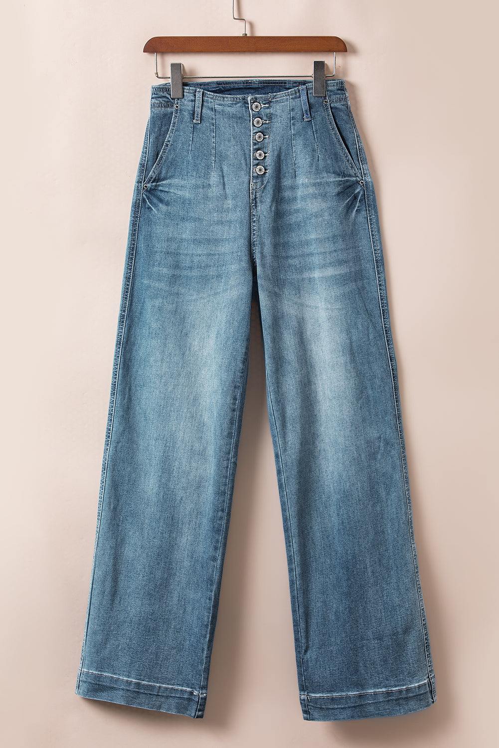 Dusk Blue Multi Buttons medium wash straight loose leg jeans on a hanger.
