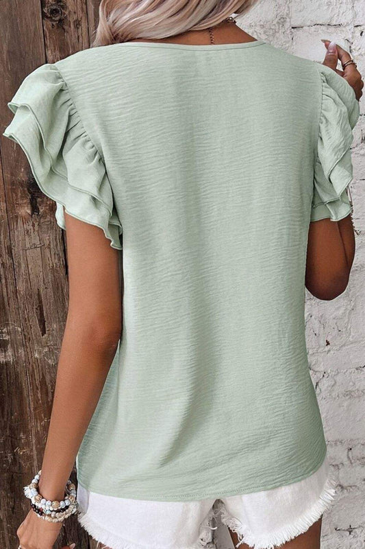 V-Neck Ruffled Cap Sleeve Blouse in soft green, featuring feminine ruffled sleeves and lightweight fabric.