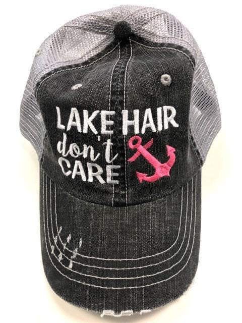 Close-up of embroidered Care Blue anchor trucker hat