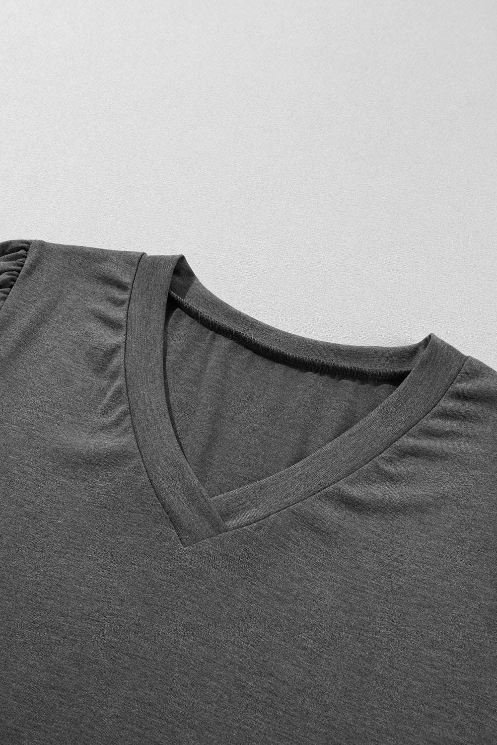 Carbon grey V-neck T-shirt with stylish petal sleeves made from breathable fabric