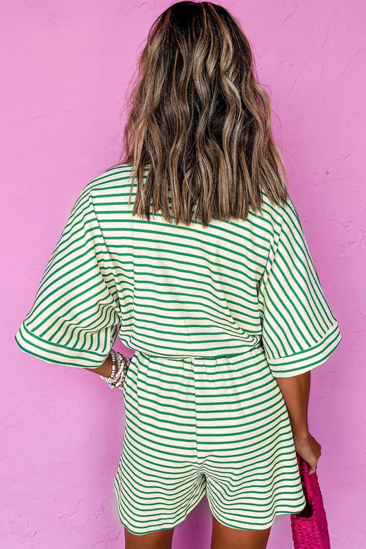 Green stripe textured short sleeve collared romper with waist tie.