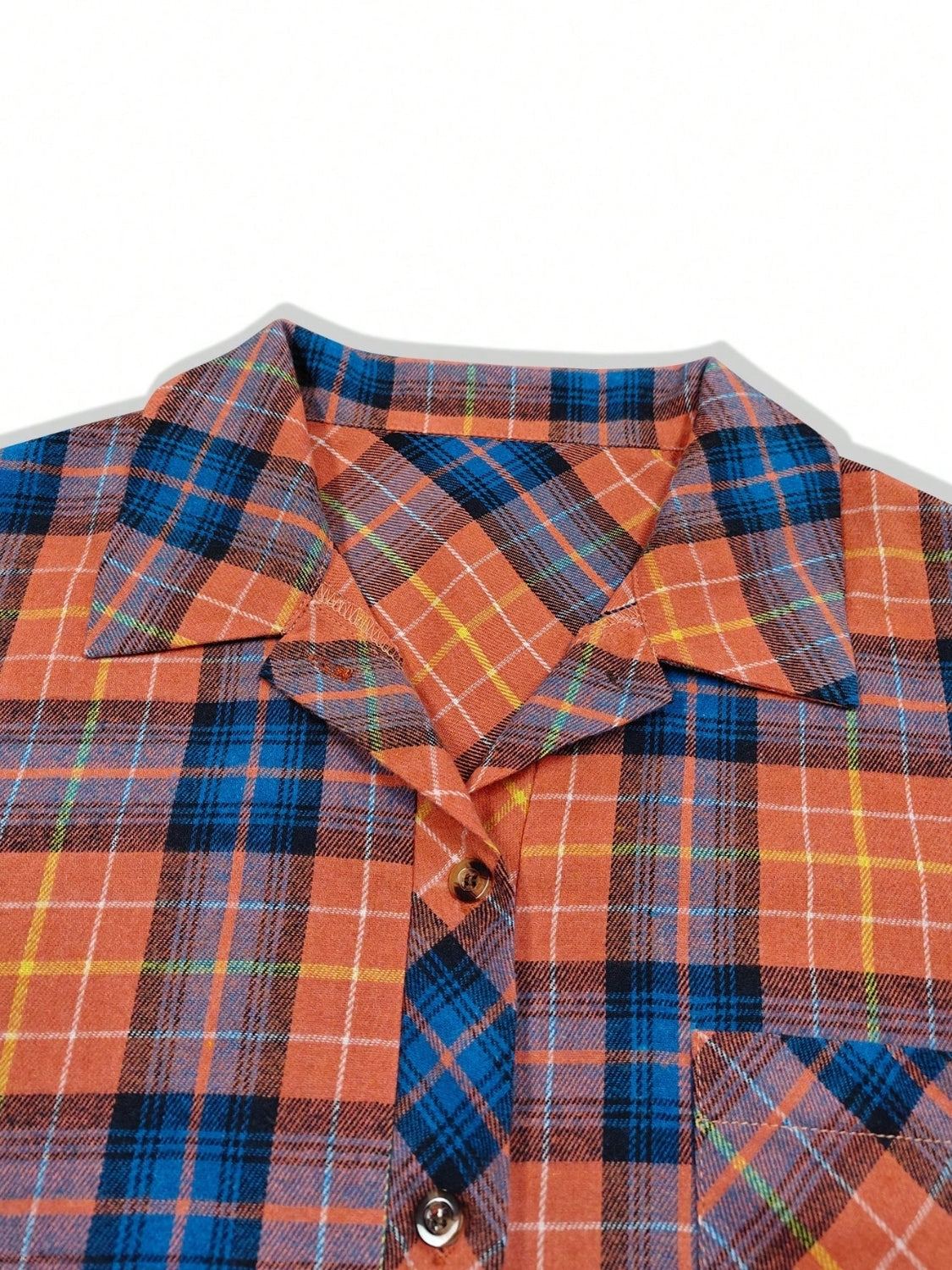 Plaid collared neck long sleeve shirt with pocket, orange and blue design.