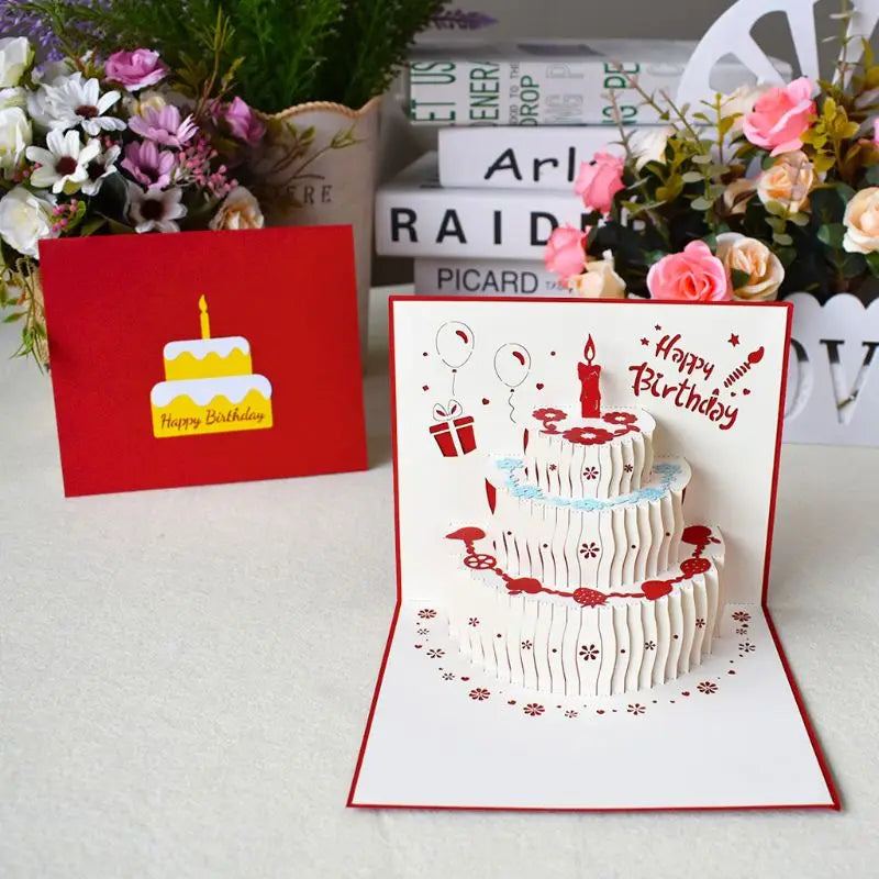 3D pop-up greeting card with birthday cake design and envelope.