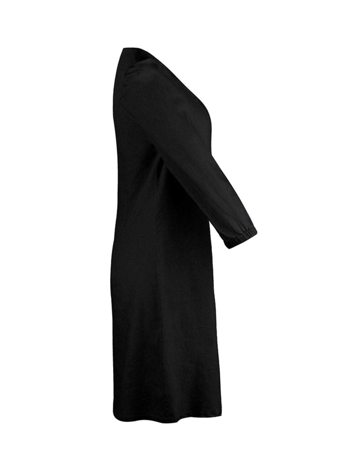 Full Size V-Neck Half Sleeve Dress in black, no stretch, composed of 65% rayon and 35% polyester.