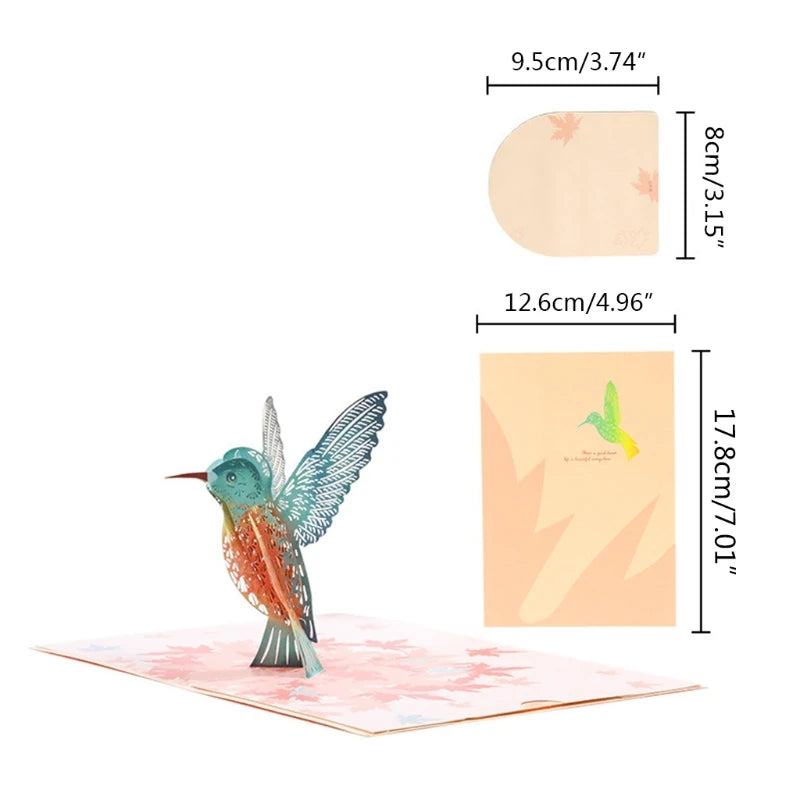 3D pop-up greeting card with envelope showcasing intricate paper carving and hummingbird design.