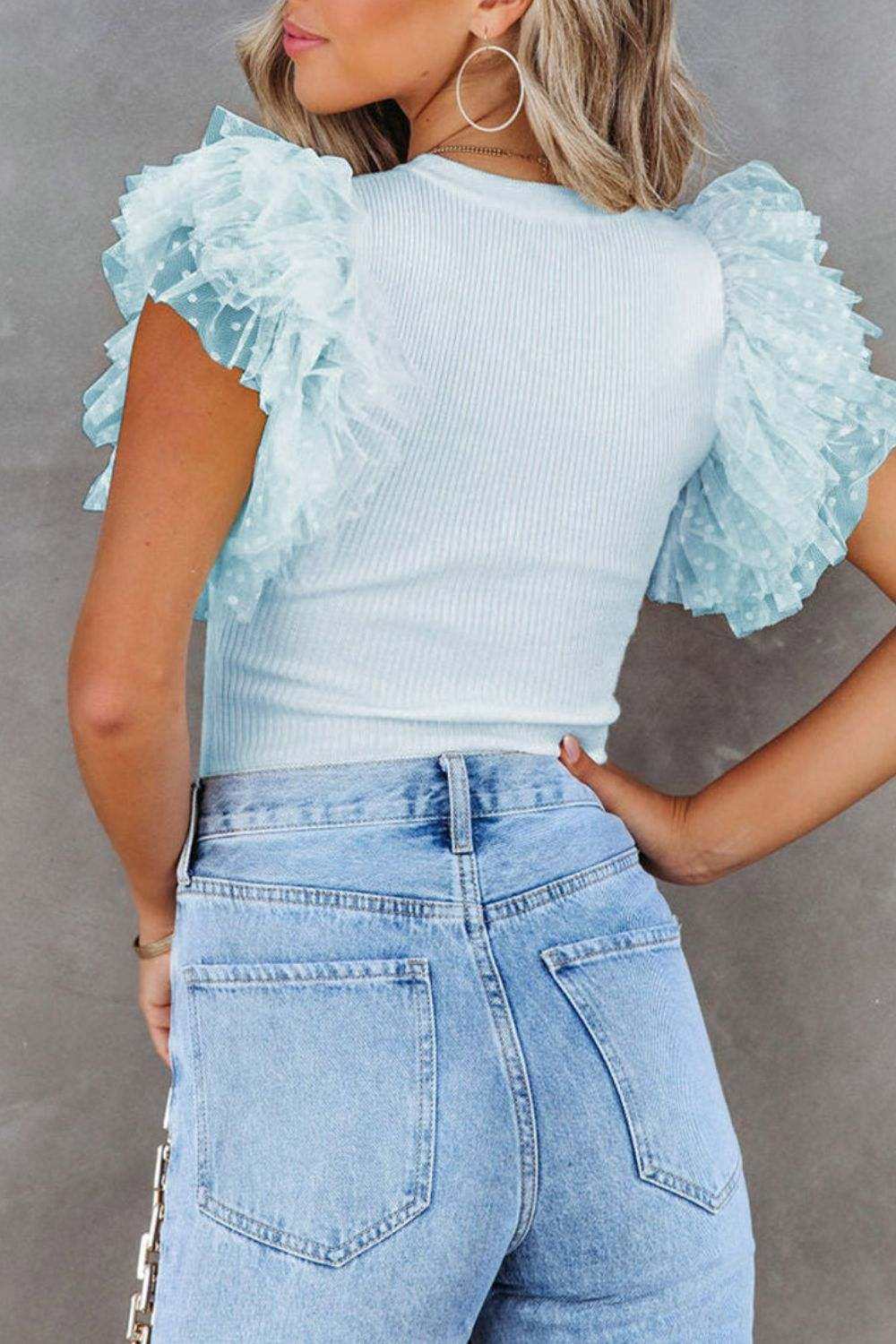 Back profile of The Niche Store’s airy round neck top with elegant, understated detailing