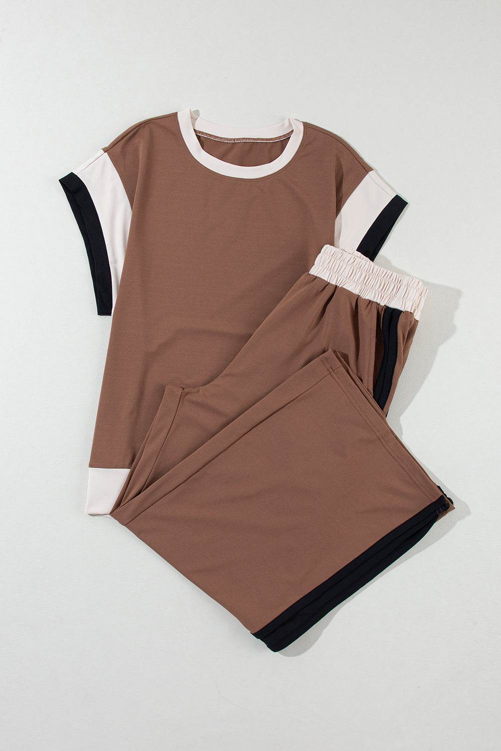 Chestnut color block casual two-piece outfit with short sleeve top and jogger pants in neutral tones