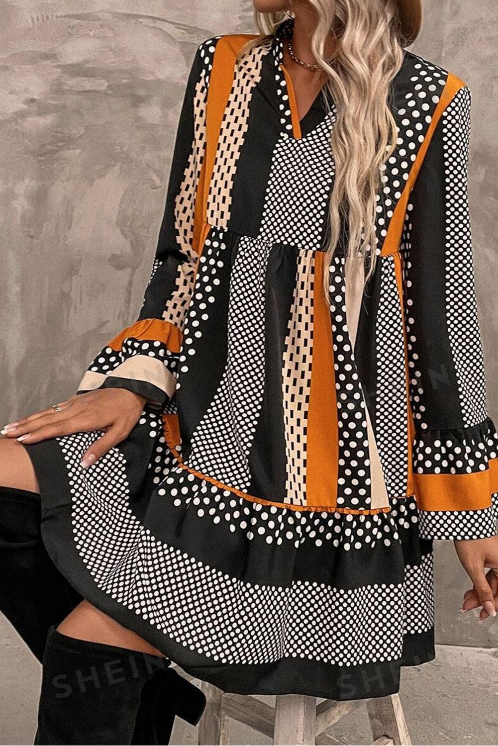 Black striped polka dot print V neck mini dress - lifestyle model shot