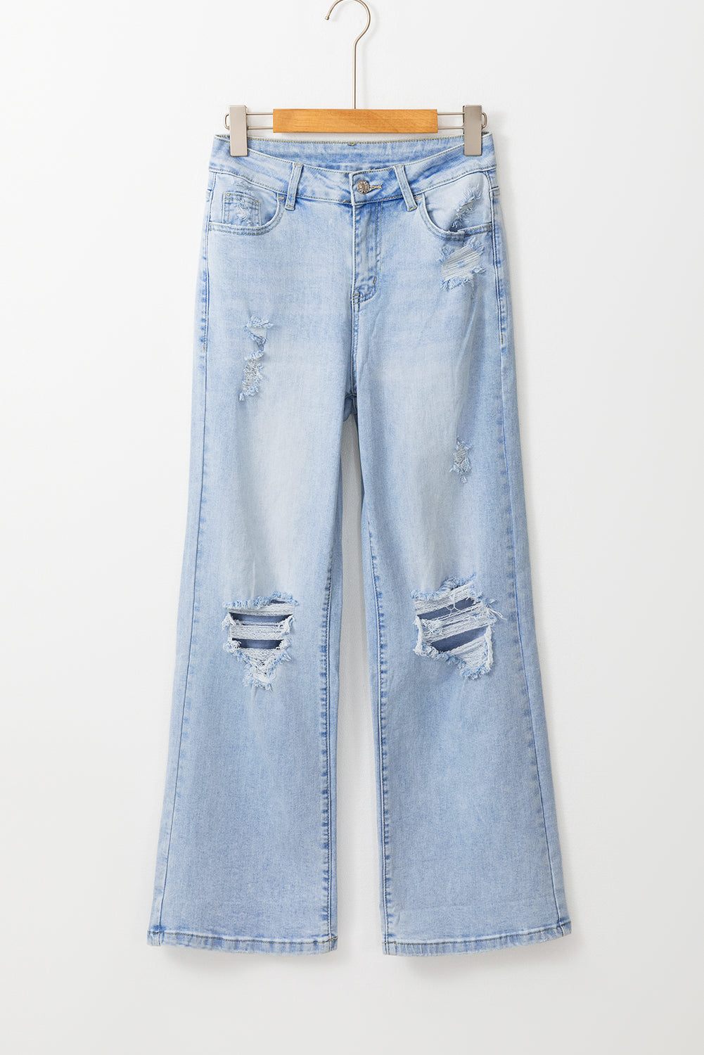Distressed knee and stitching on Beau Blue Vintage Light Wash Distressed Flare Jeans