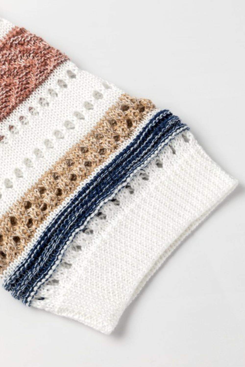 Hollow Out Half Sleeve Striped Knit Top with intricate knit pattern and bold stripes.