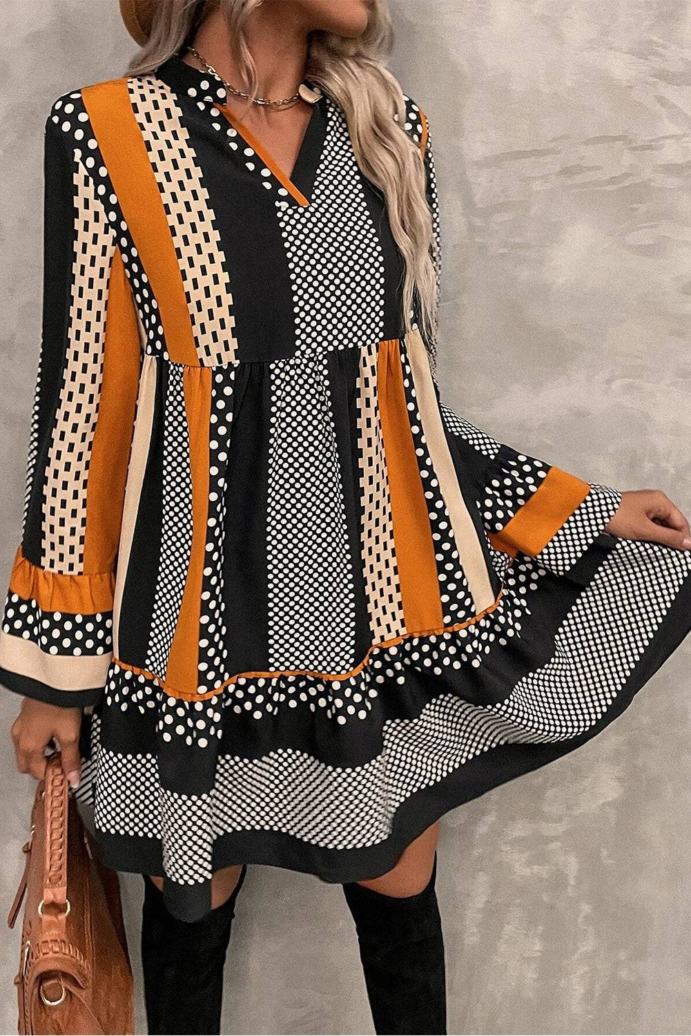 Black striped polka dot print ruffled mini dress - close up pattern detail