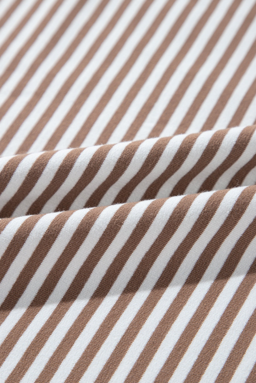 Khaki stripe pattern on fabric for patchwork T-shirt.