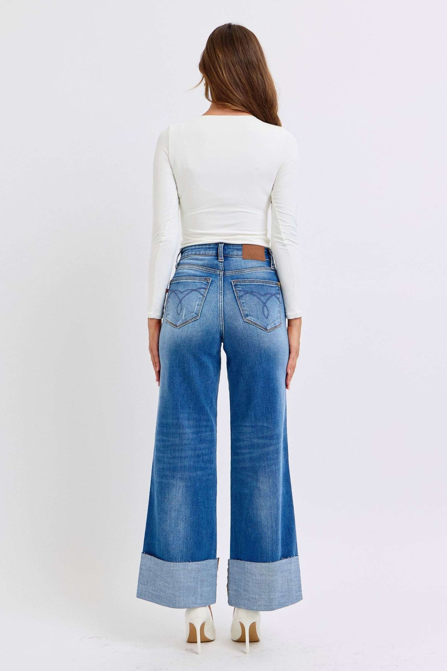 Judy Blue distressed high waist wide leg jeans, back view with a relaxed fit and stylish detailing.