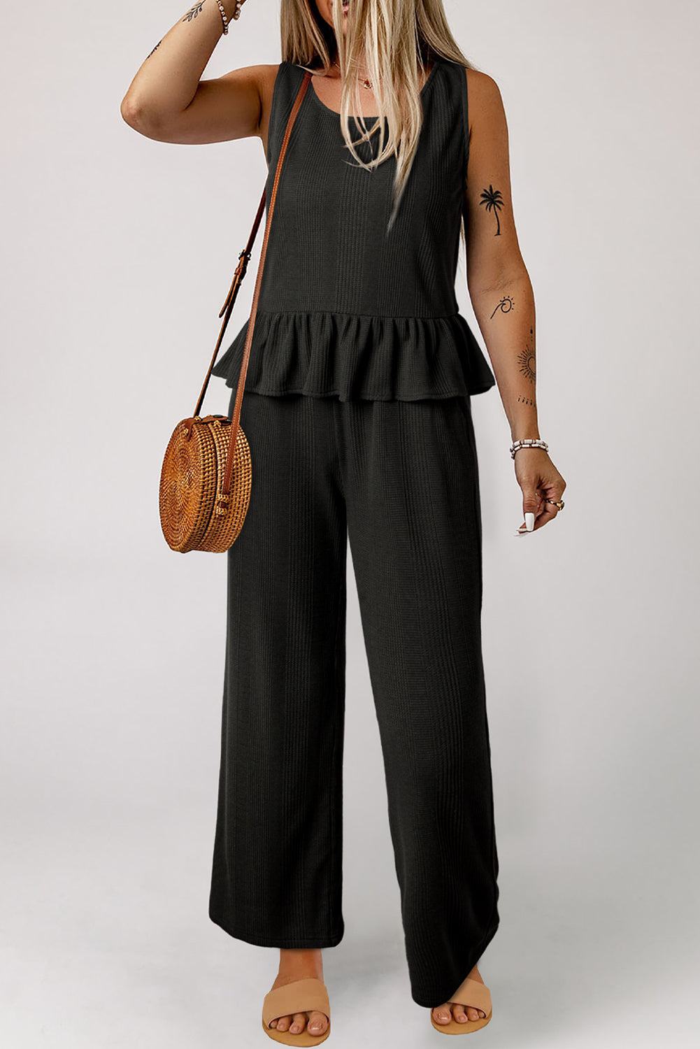 Black ribbed ruffle tank top and pants set, women's stylish two-piece outfit.