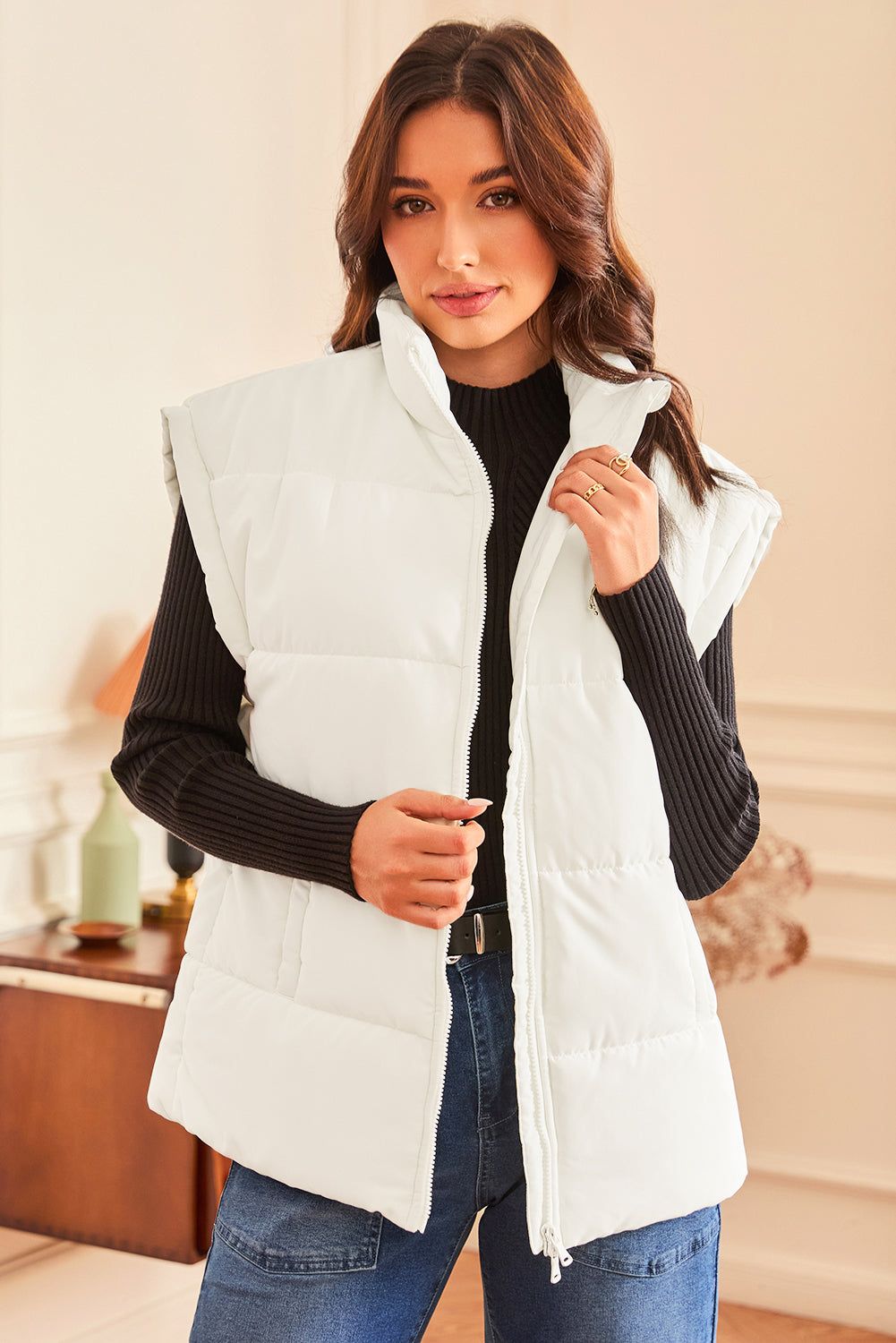 Woman wearing a Solid Zipper Stand Neck Oversized Puffer Vest in a stylish indoor setting.