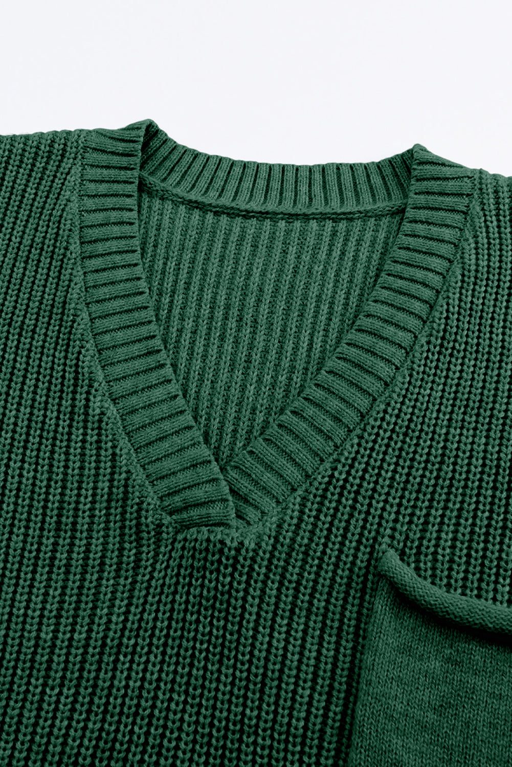 close colar view of green knitwear set