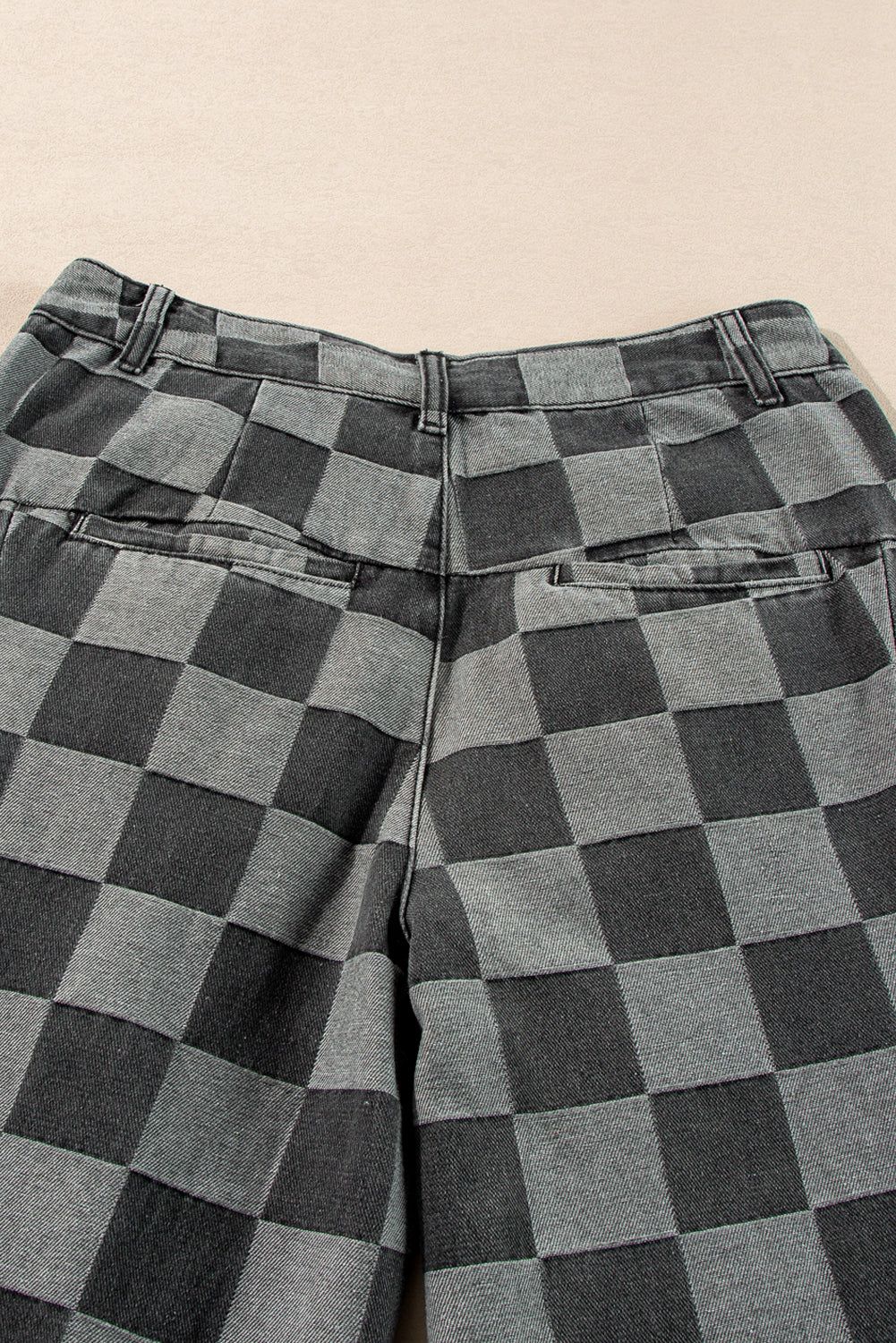 Dark grey checkered wide-leg denim jeans with bold style and relaxed fit