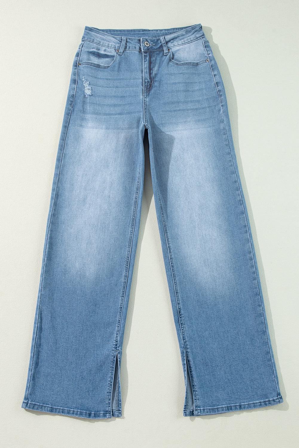 High rise slit leg jeans - front view with high rise waistline lay flat