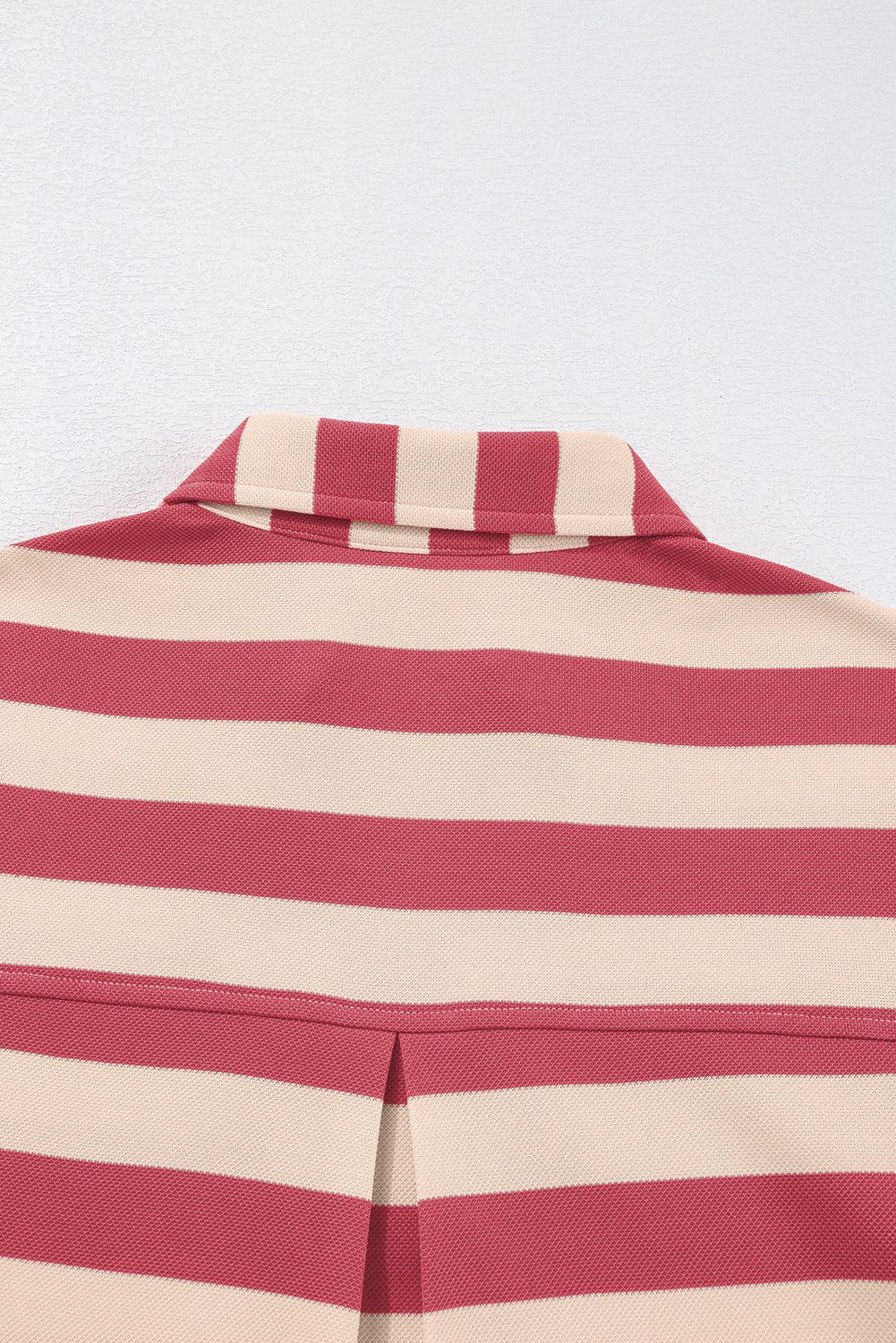 Striped mini dress with Johnny collar and long sleeves, showcasing classic chic design.