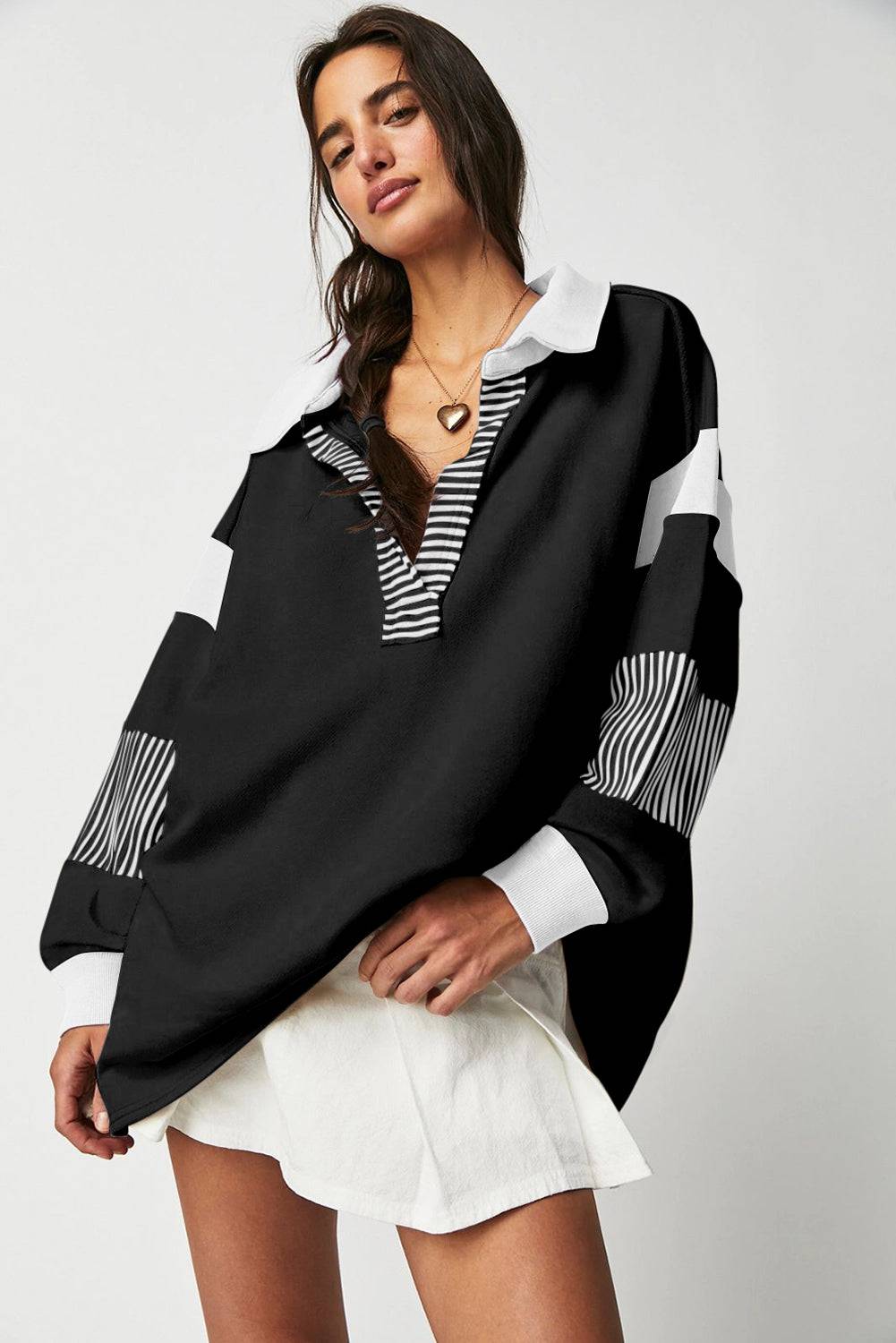Black Striped Colorblock shirt raised to show shorts