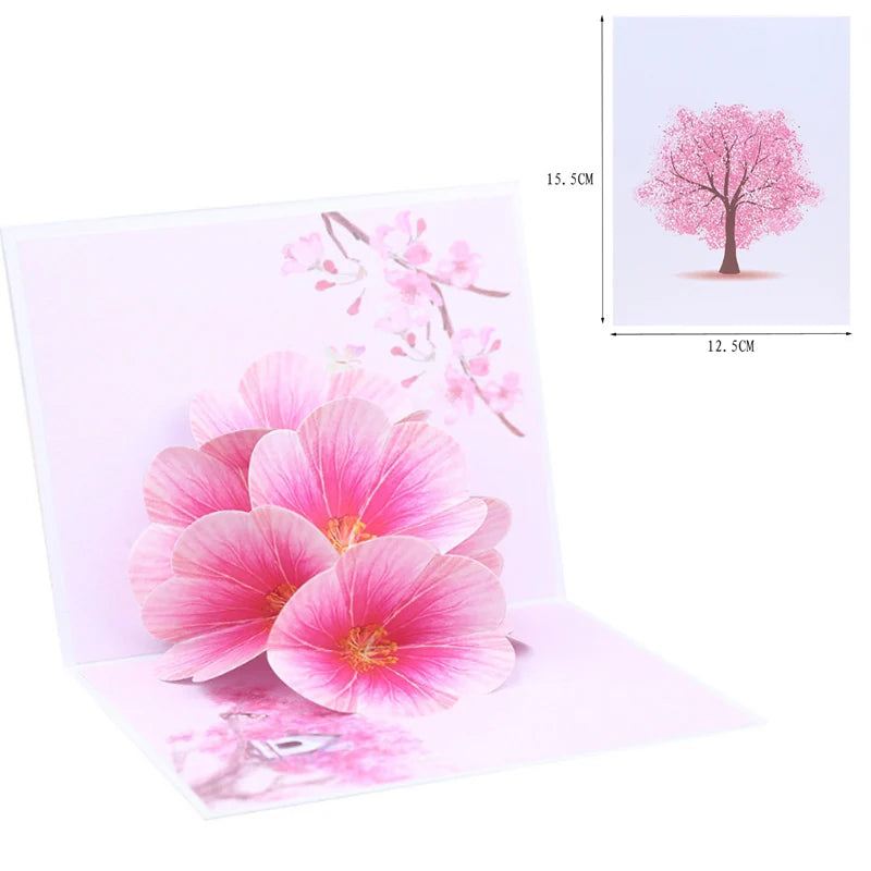3D pop up greeting card with pink floral design and envelope, perfect for special occasions.