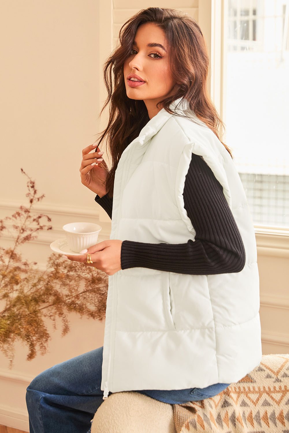 Woman wearing Solid Zipper Stand Neck Oversized Puffer Vest.