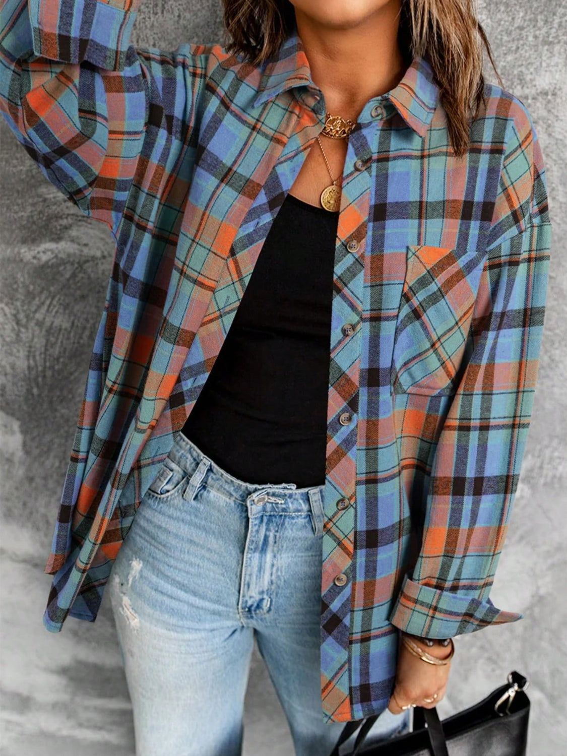 Plaid collared neck long sleeve shirt with pocketed design.