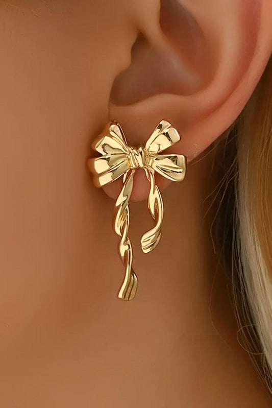 Gold plated alloy bow knot earrings - close up detail view