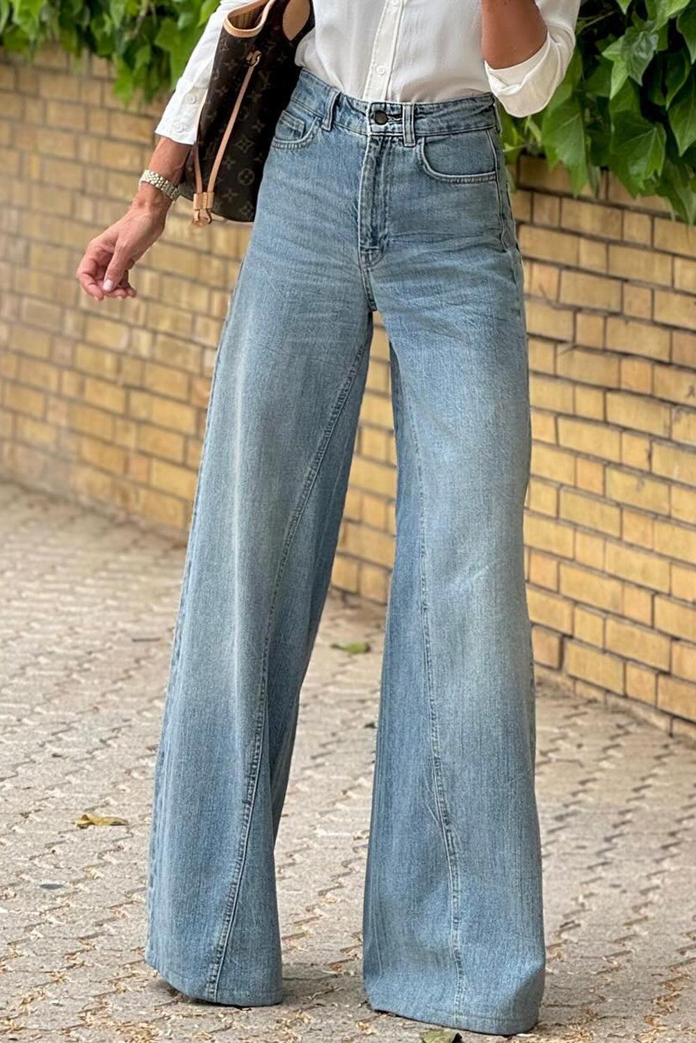 Dusk blue acid wash extra wide leg high waist long jeans for women with a trendy edgy look and flattering fit