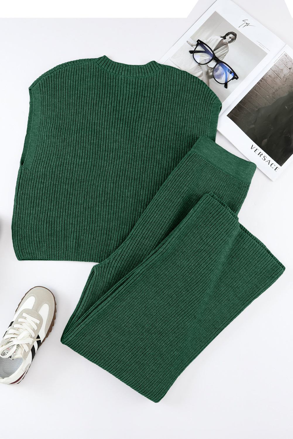 green knitwear set white background