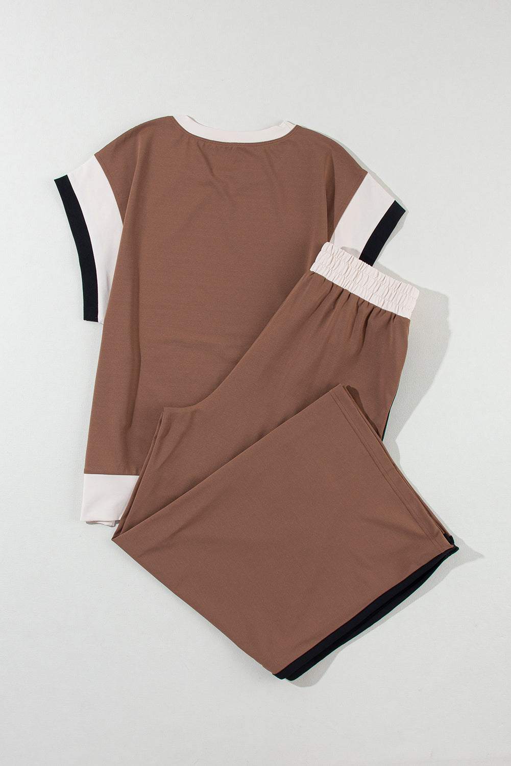 Chestnut color block casual two-piece outfit with relaxed top and jogger pants in neutral tones