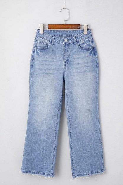 Beau Blue Mineral Wash Raw Hem High Waist Flared Jeans with vintage style and flattering fit.