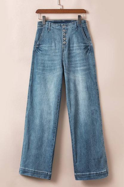 Dusk Blue Multi Buttons medium wash straight loose leg jeans on a hanger.