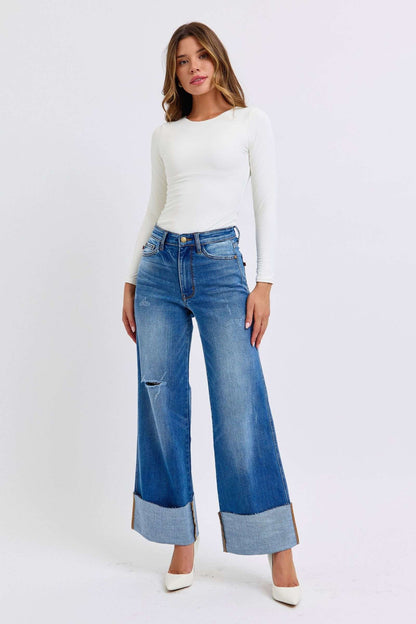 Judy Blue Full Size Distressed High Waist Wide Leg Jeans with edgy distressed detailing and a relaxed fit.