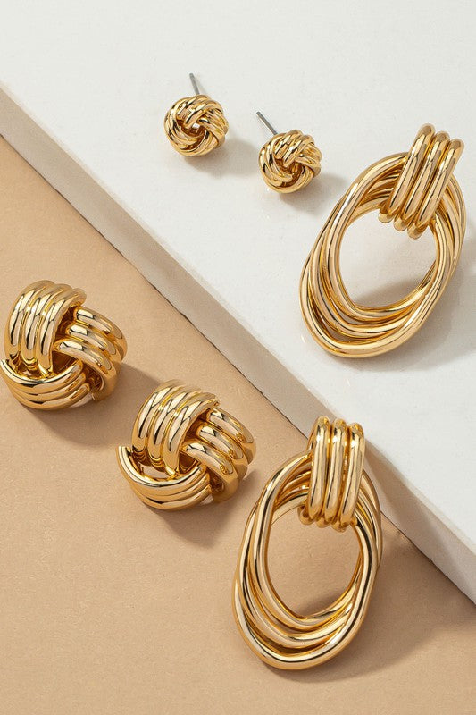 Premium Trio Metal Knot and Hoop Earrings displayed on stand