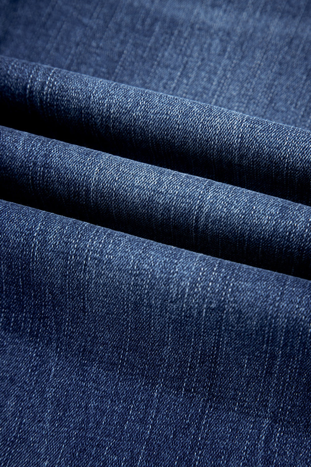 Mineral wash flared jeans in sail blue with trendy raw hem finish