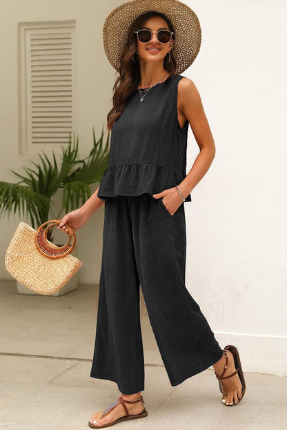 Black ribbed ruffle tank top and pants set, stylish 2-piece outfit for women.