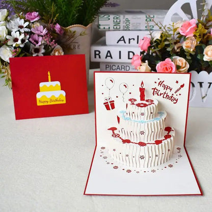 3D pop-up greeting card with birthday cake design and envelope.