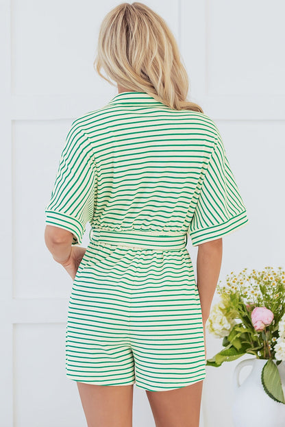 Green stripe textured short sleeve romper with waist tie.