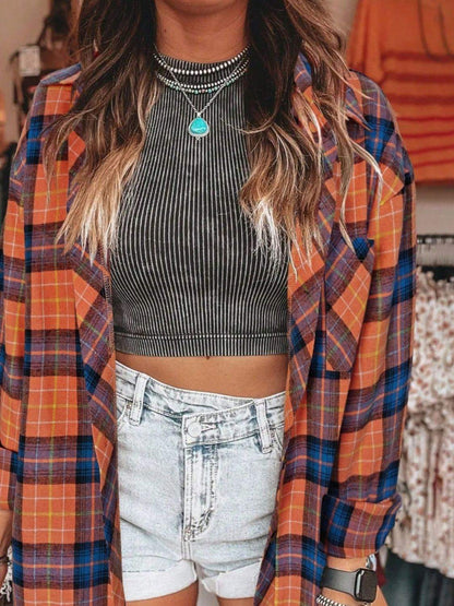Plaid collared neck long sleeve shirt with pocket detail.