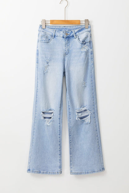 Distressed knee and stitching on Beau Blue Vintage Light Wash Distressed Flare Jeans
