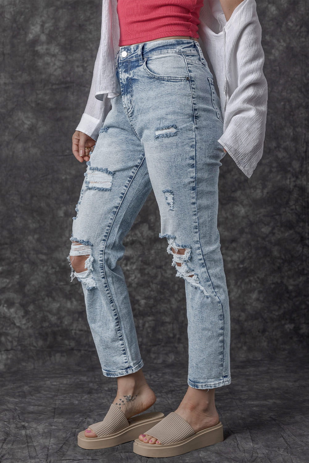 Jean slim taille haute bleu marine délavé à franges