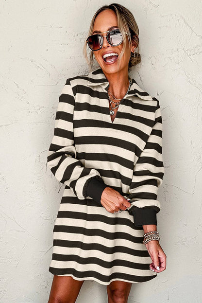 Striped mini dress with Johnny collar and long sleeves, worn by smiling woman.