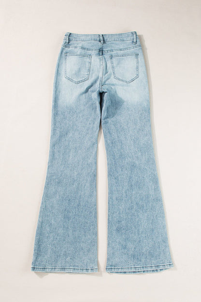 Dusk blue acid wash women's high waist extra wide leg long jeans laid flat back view