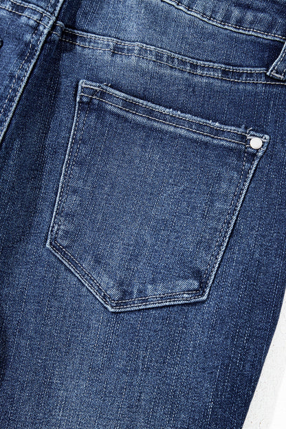 Sail blue denim jeans with high waist, flared silhouette and raw hem