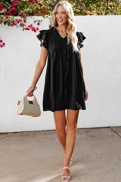 Black Ruffle Sleeve View with purse 