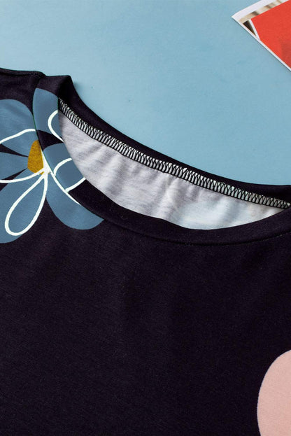 Black casual round neck t-shirt with vibrant summer flower print on black background