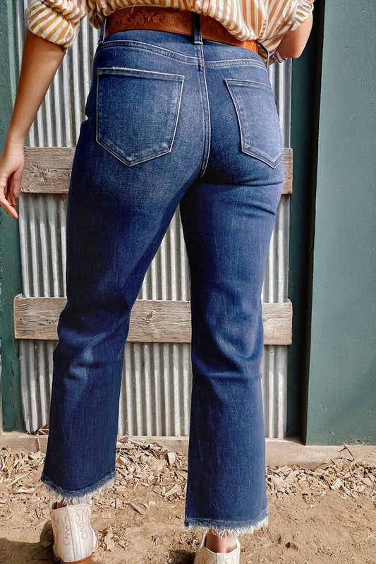 Sail blue denim jeans with high waist, flared silhouette and raw hem
