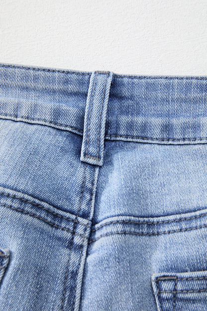 High waist flared denim featuring mineral wash and raw edge